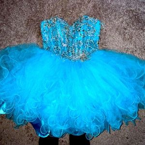 Turquoise Mini dress w/ Rhinestones on front and back of dress